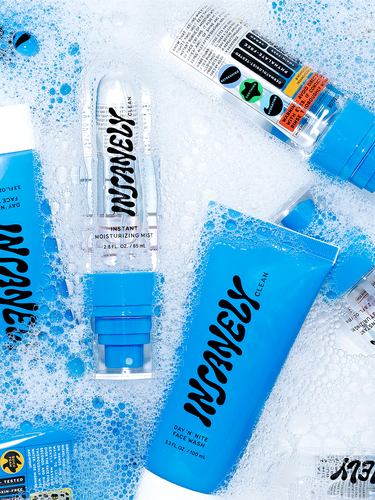 Best men's skincare essentials for clean and hydrated skin, lying in soapy water.